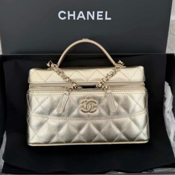 CHANEL Handbags - CHANEL Gold Quilted Vanity Satchel with Chain Handle